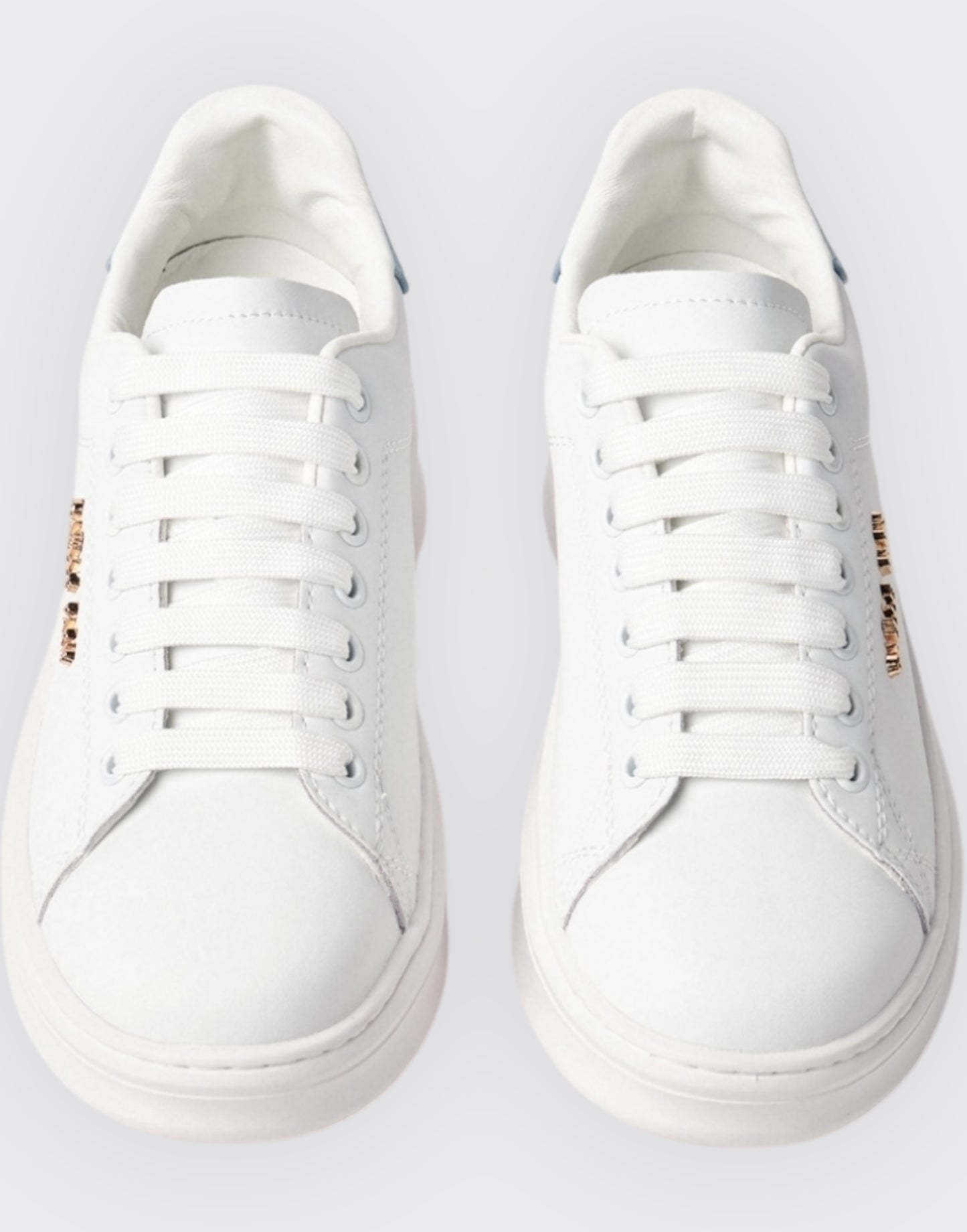 Sneakers con inserto denim