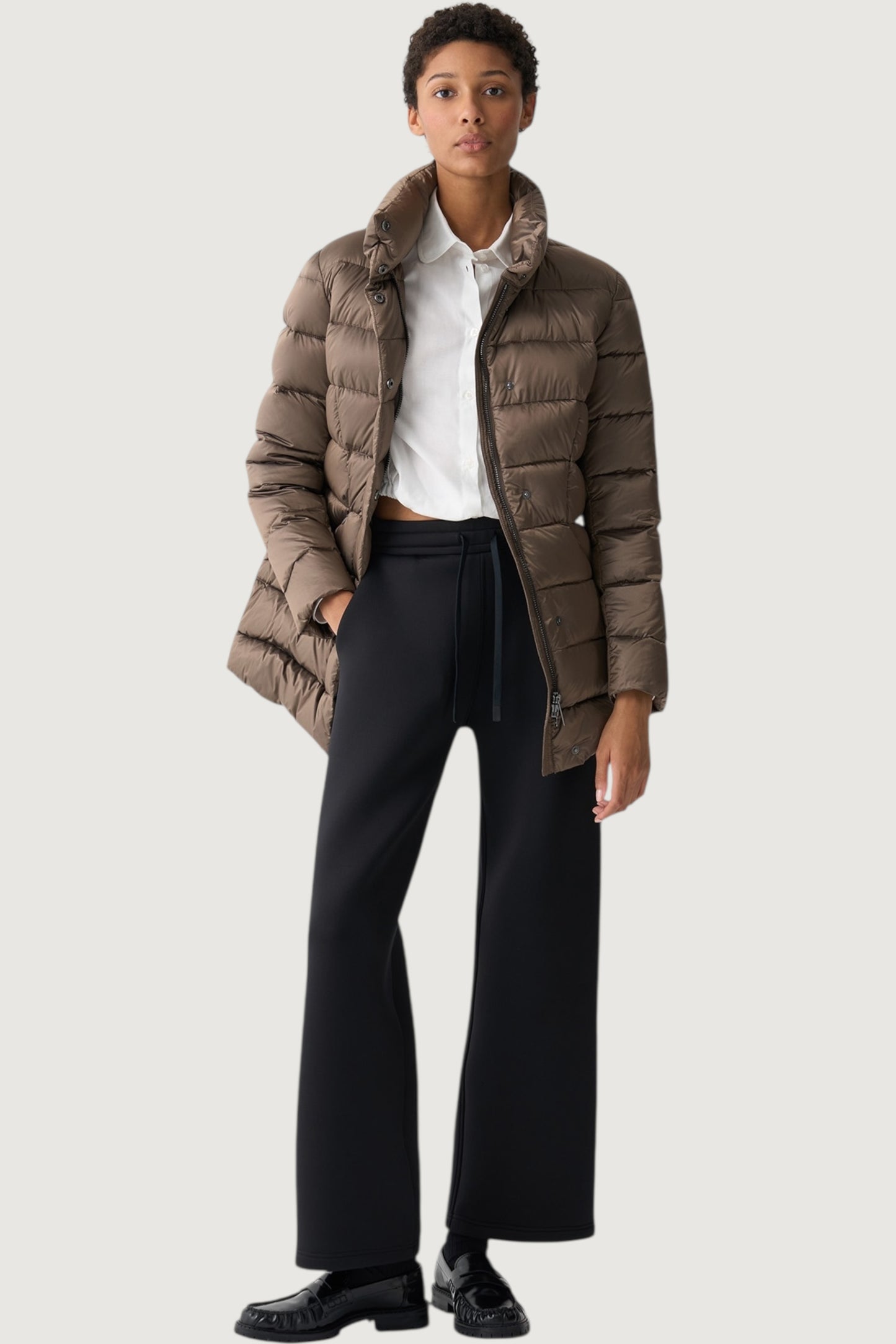 Piumino collo alto sfiancato