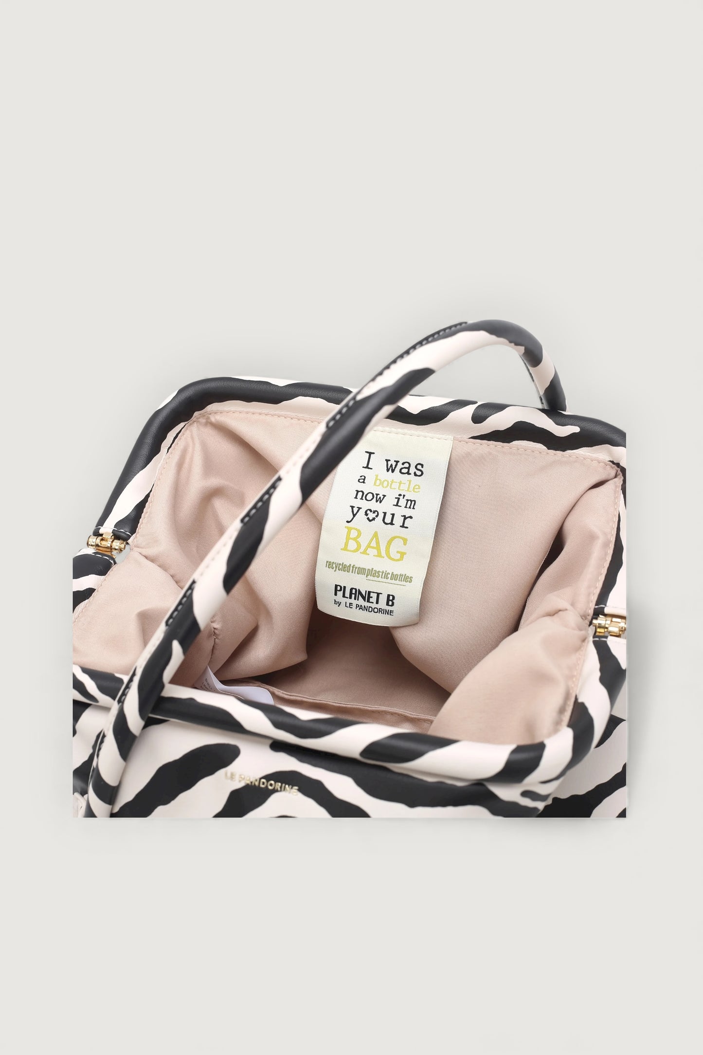 Bottle bag zebra beige/nero