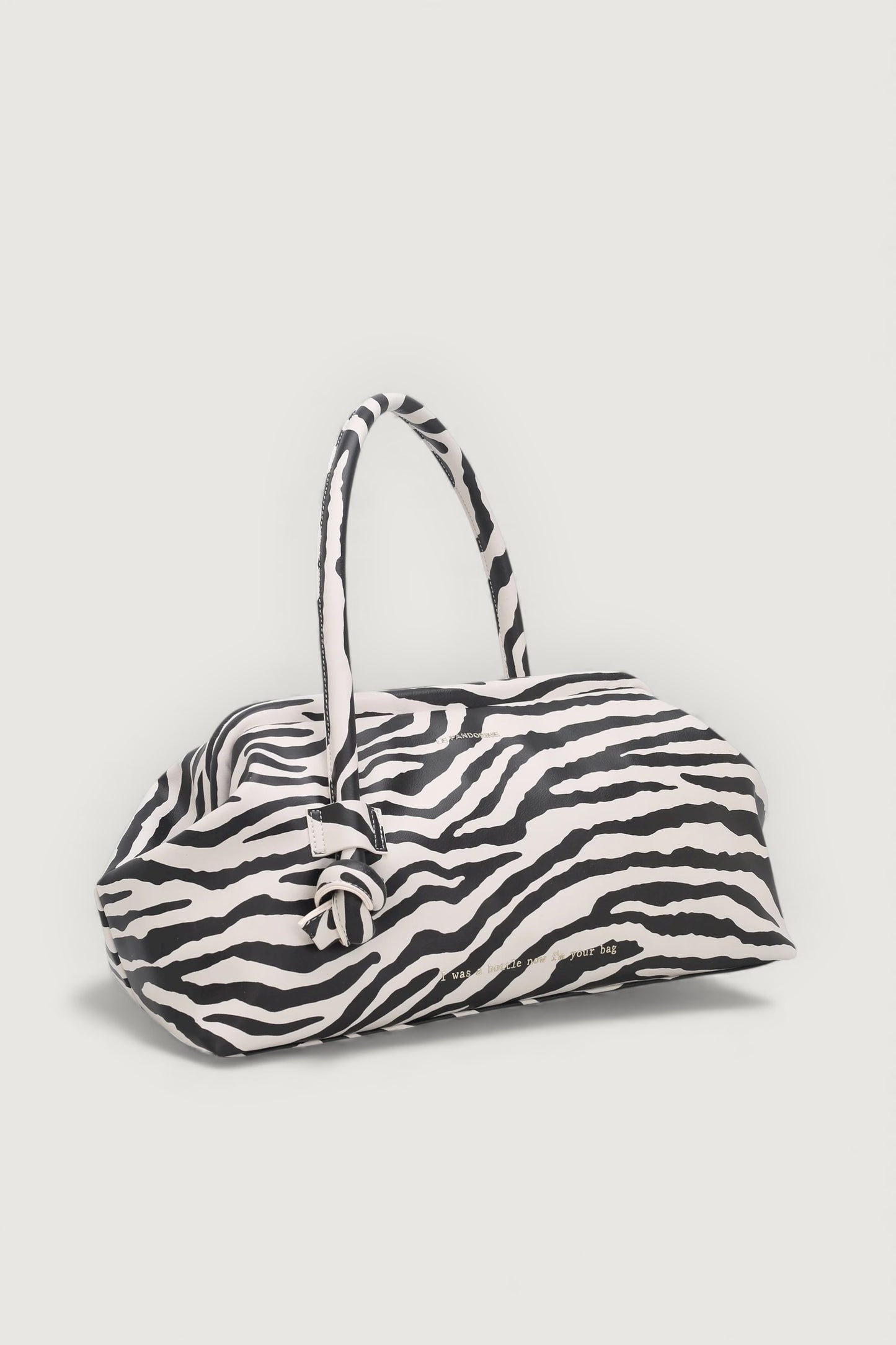 Bottle bag zebra beige/nero