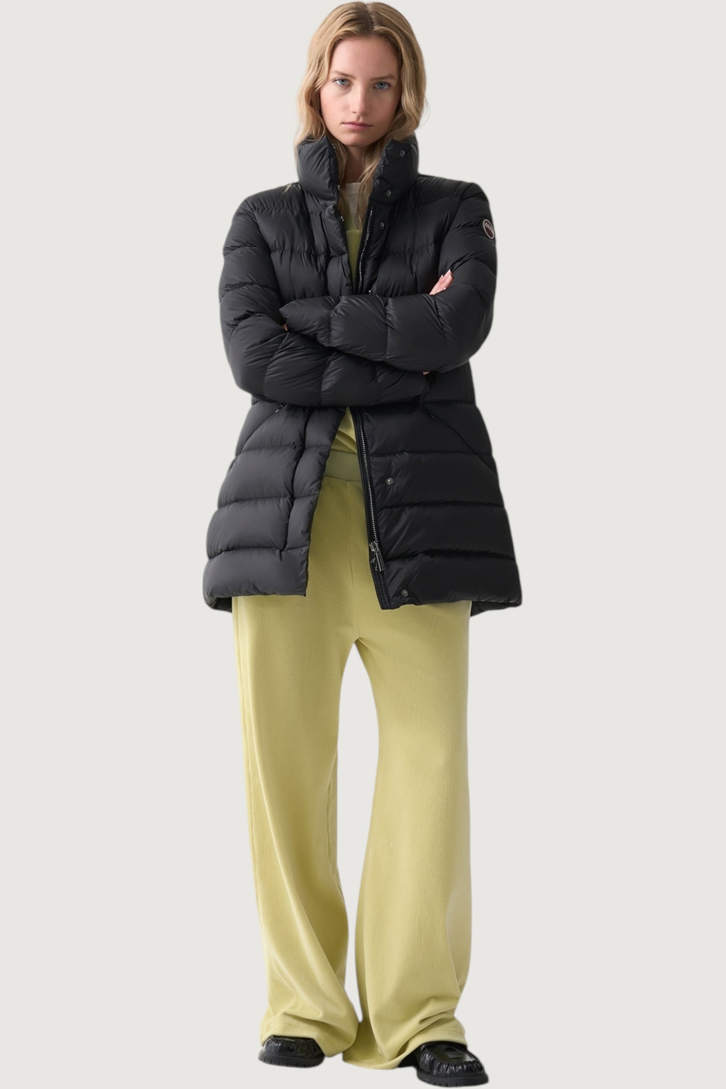 Piumino collo alto sfiancato