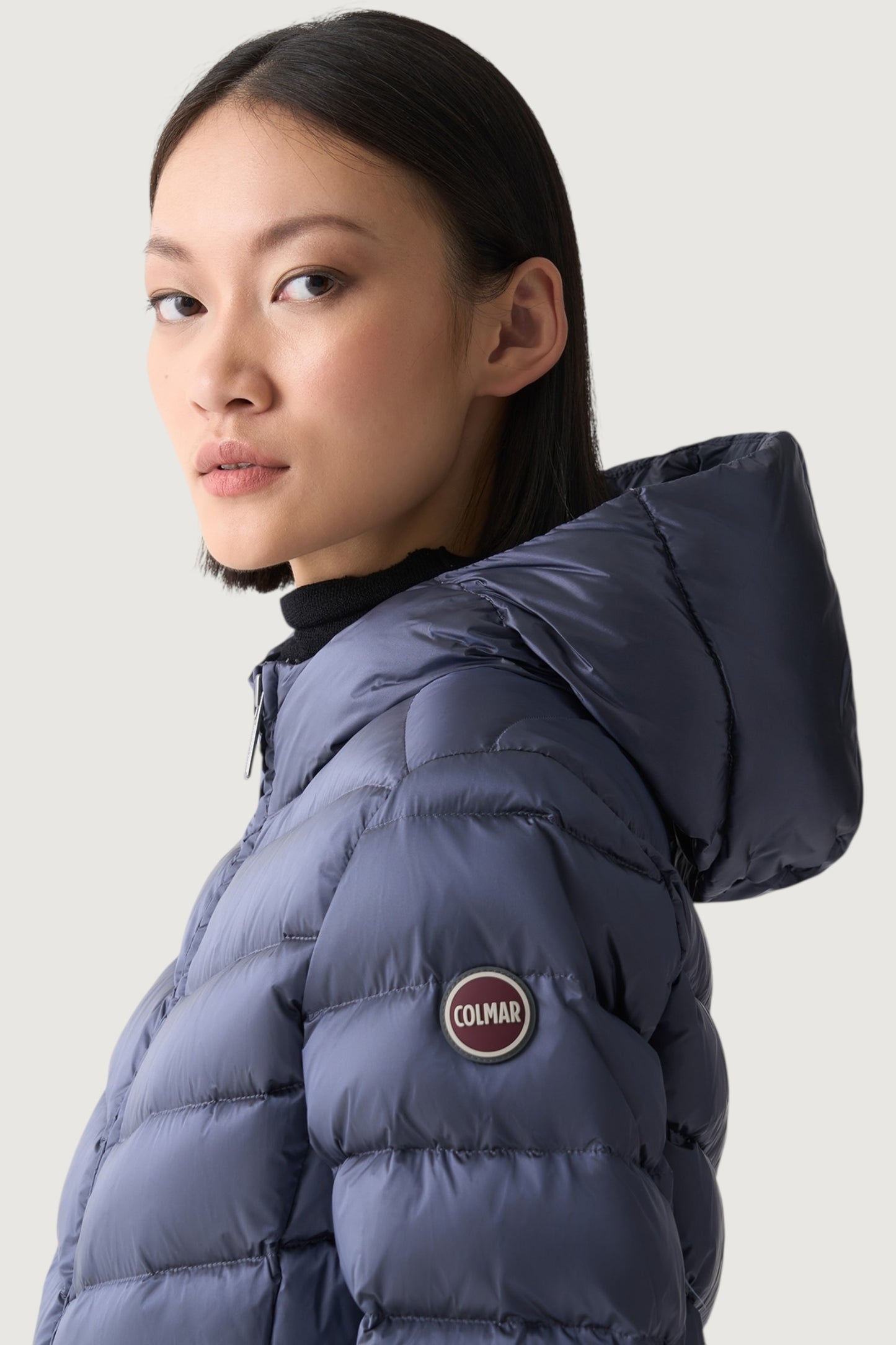 Piumino con cappuccio