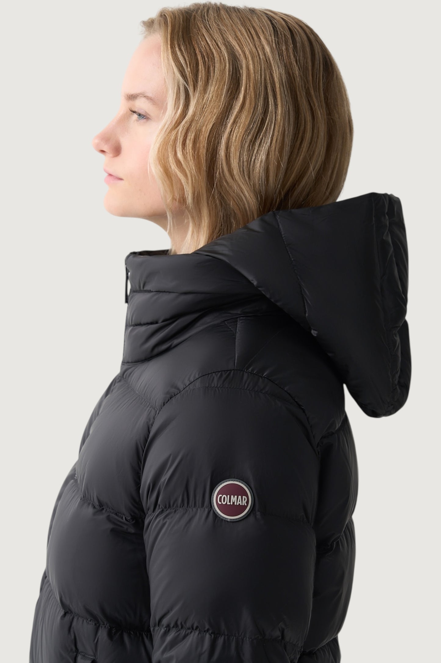 Piumino con cappuccio staccabile