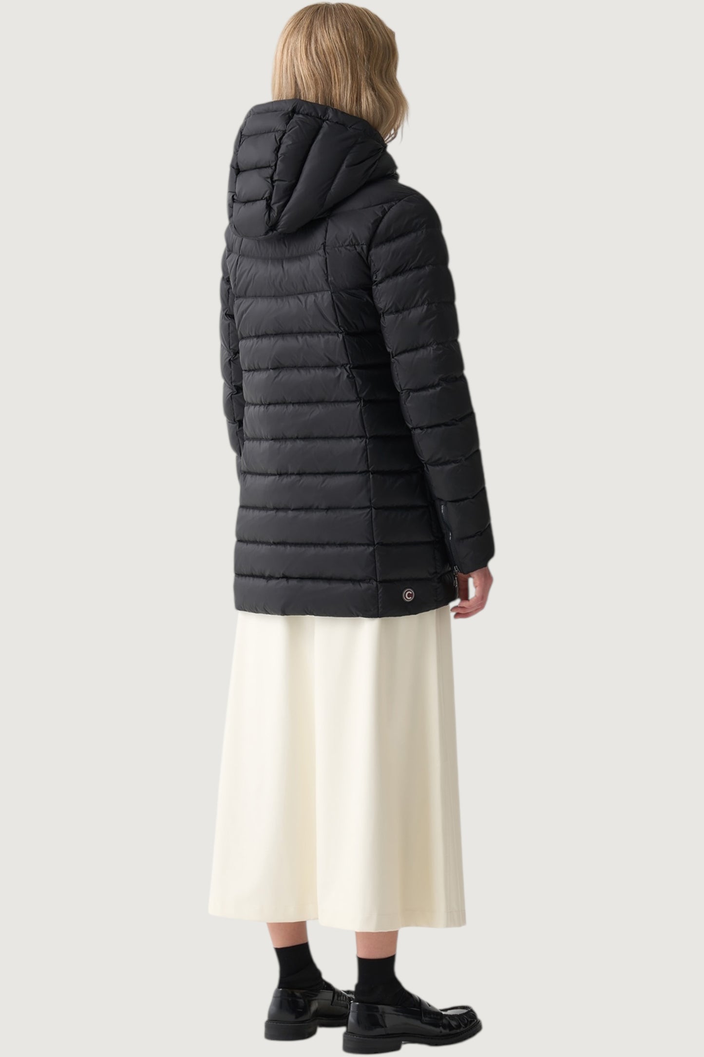 Piumino a trapezio con cappuccio