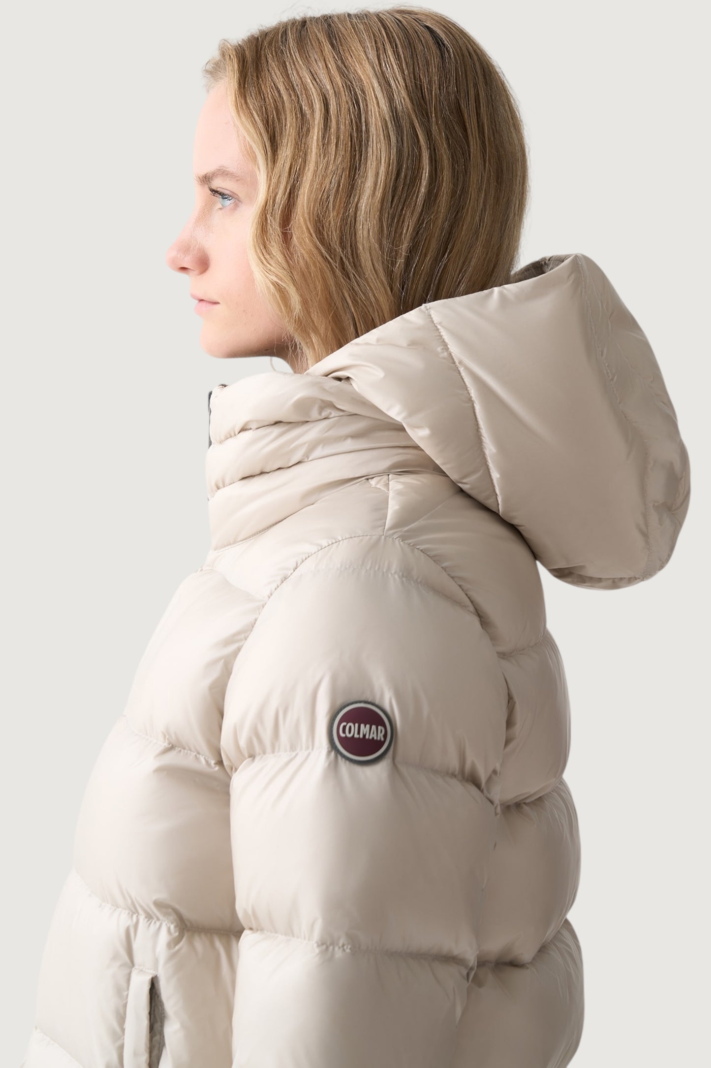 Piumino con cappuccio staccabile