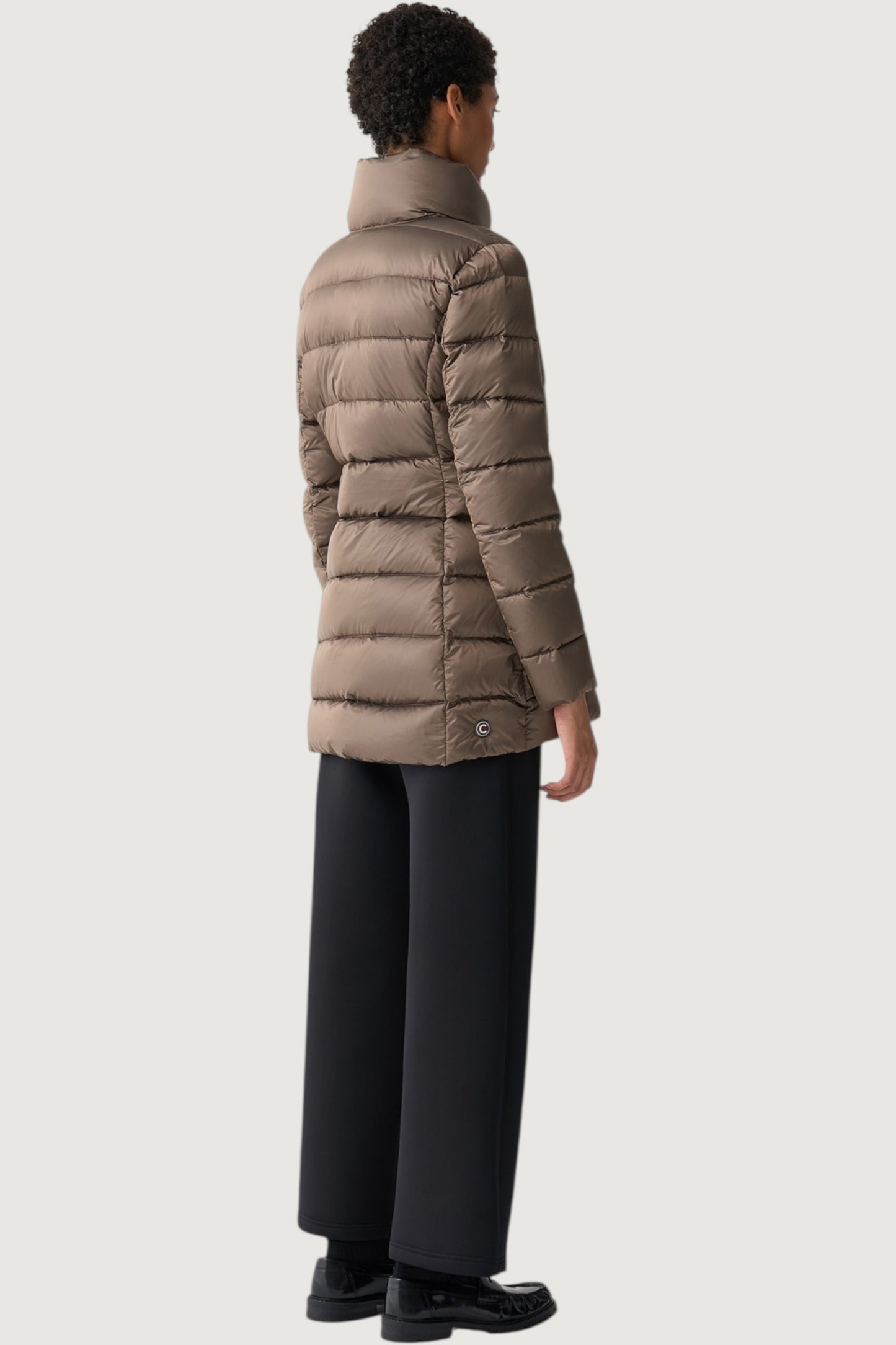 Piumino collo alto sfiancato